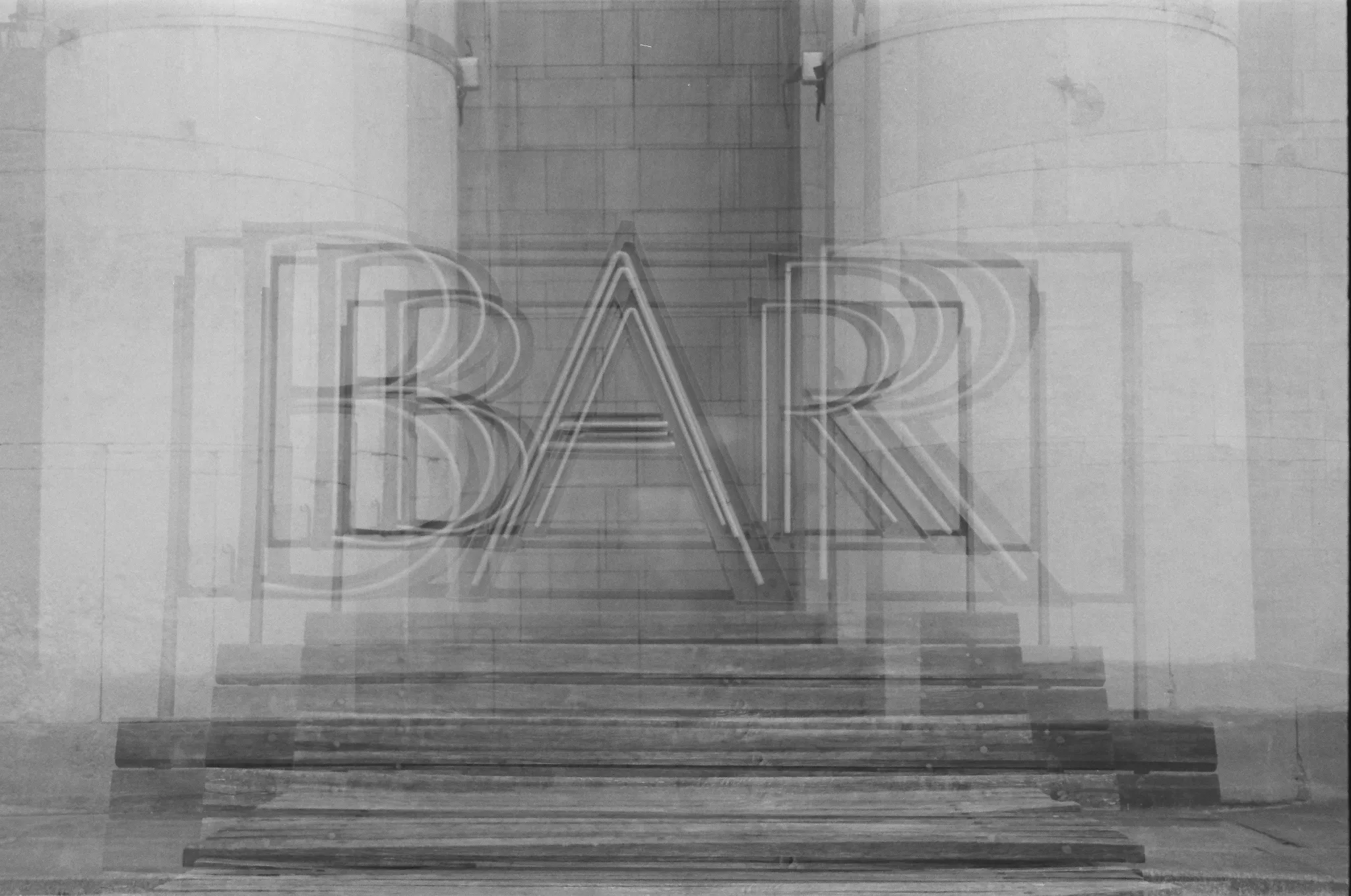 Black and white photo of a neon 'BAR' sign superimposed on steps and columns.