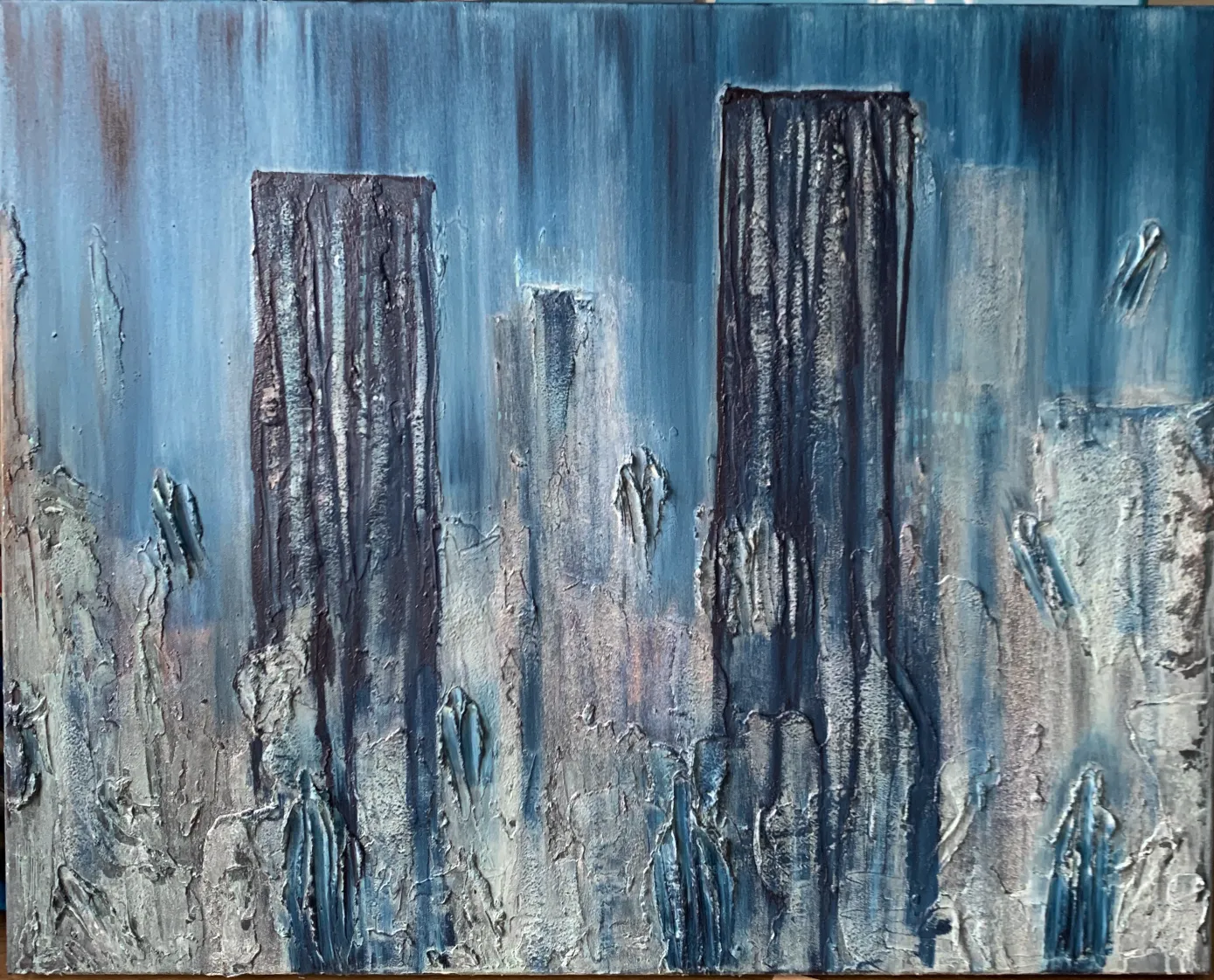A textured painting of tall buildings in blue tones with a ghostly atmosphere.
